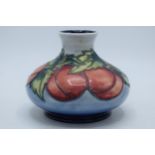 Moorcroft squat vase decorated with plums, 10cm tall. In good condition with no obvious damage or