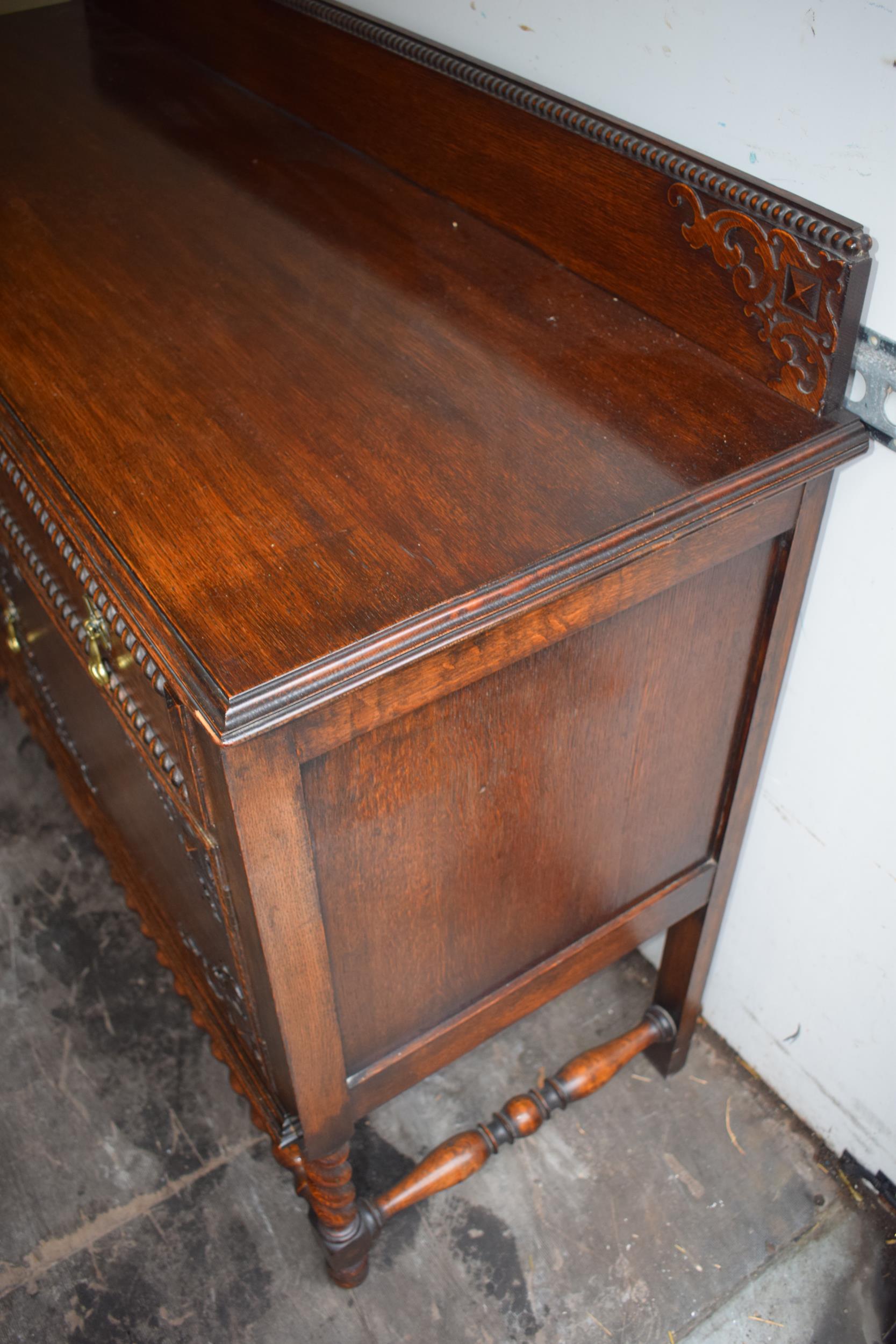 1930s oak sideboard with carved decoration with drawers and cupboards, 153x51x107cm tall. In good - Image 9 of 9