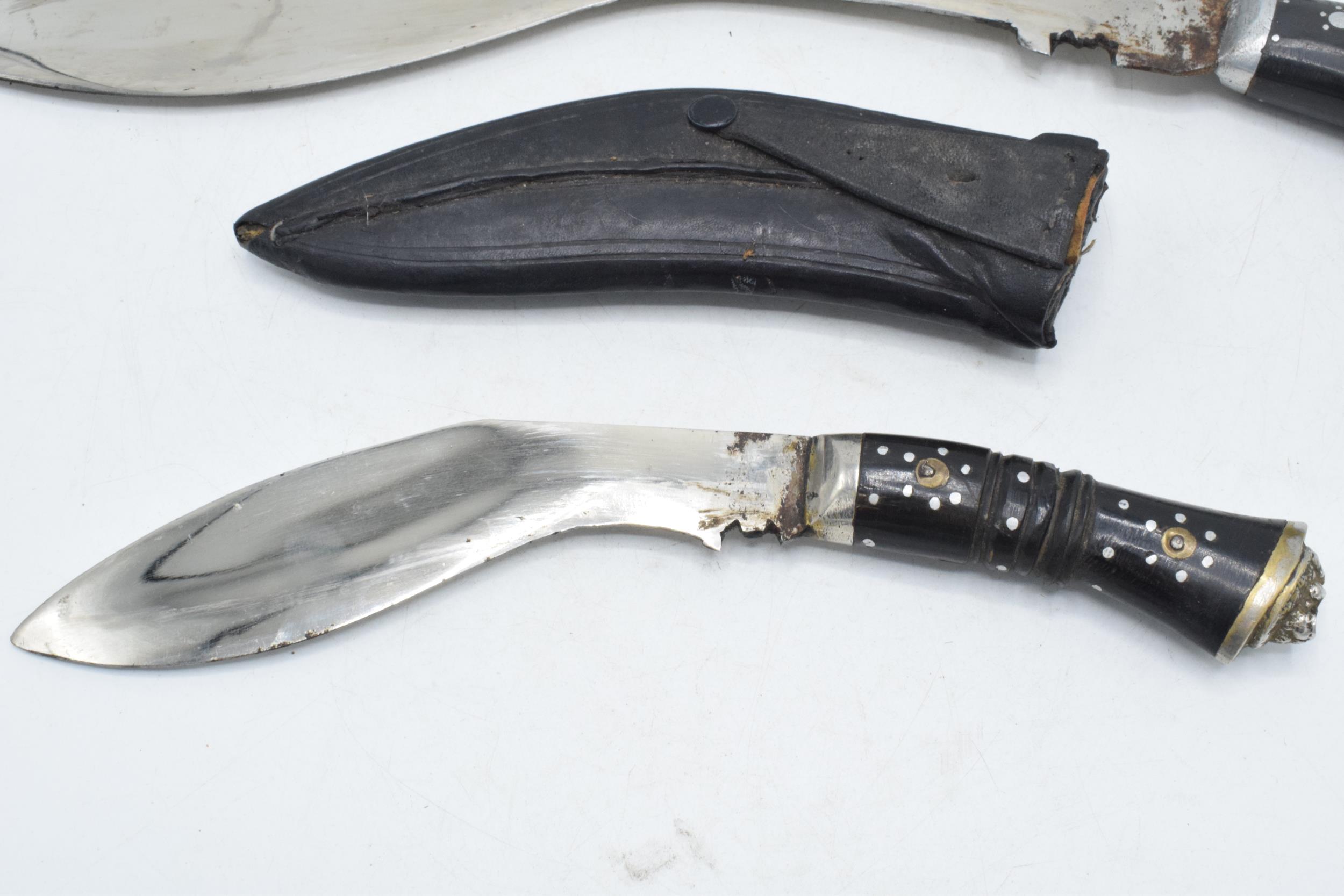 20th century Gurkha style Kukri knife in black leather scabbard together with smaller example (2), - Image 2 of 7