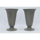 A pair of Wedgwood ribbed trumpet vases in a speckled grey glaze, impressed and printed marks to