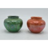 A pair of Moorcroft vases with lustre finishes in green and orange, 7.5cm diameter (2). In good