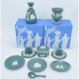 Wedgwood Jasperware in teal: to include a pair of candlesticks, a spoon, a trinket, vases etc (9).