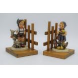A pair of Goebel / Hummel bookends on wooden bases to include Little Goat Herder No.250 and