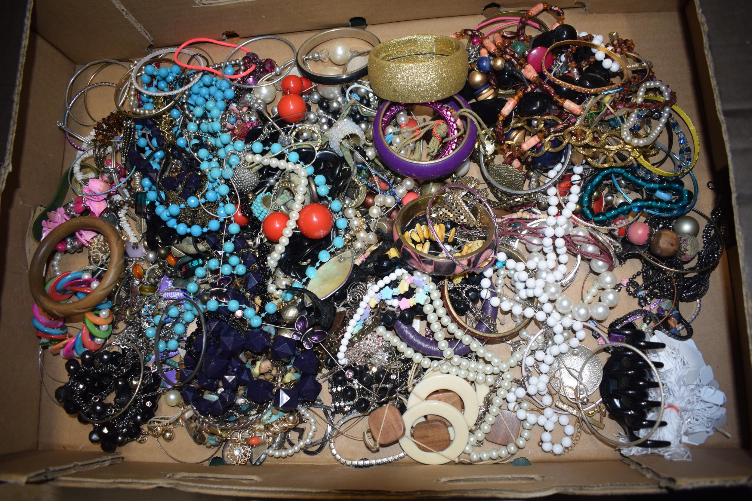 A large and varied collection of costume jewellery to include bangles, bracelets, necklaces, chain - Image 2 of 2