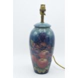 Large Moorcroft lamp base in Finch and Berry pattern, 26.5cm tall exc. brass fittings (cracked).