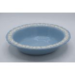 Wedgwood Queensware white on blue vegetable bowl, 24cm diameter. In good condition with no obvious