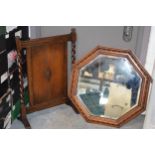 1930s octagonal oak carved mirror, 63cm diameter, together with a similar fire screen, 72cm tall (