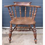 19th century elm/ash captains chair, 81cm tall. In good condition, arms slightly loose. Old worm