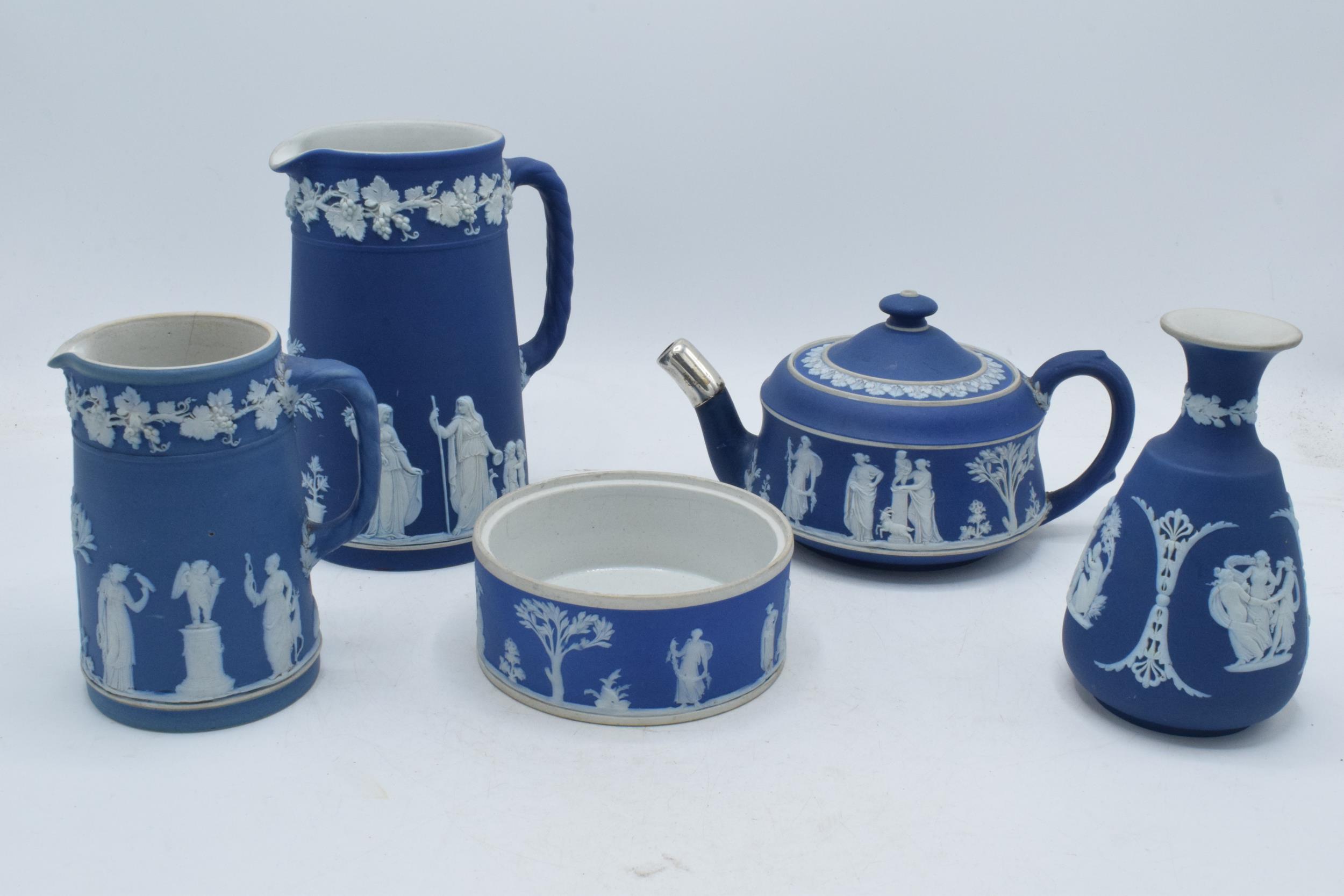 19th century and later Wedgwood Jasperware in dip / dark blue: to include a teapot, water jugs, a