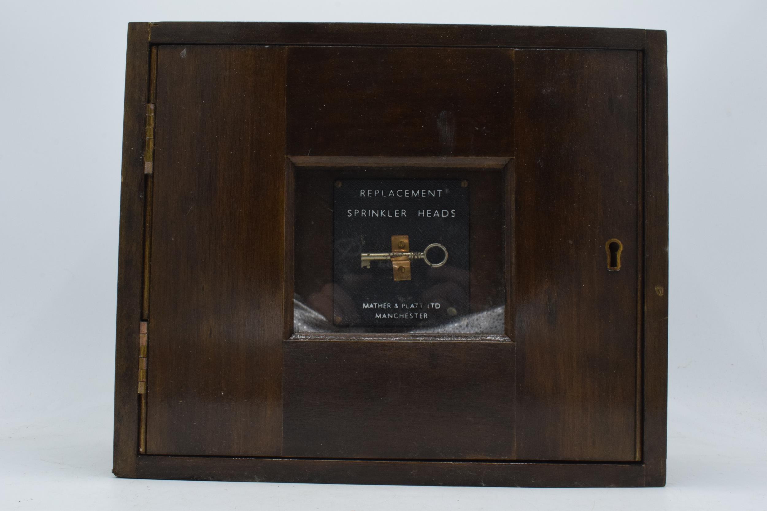 Vintage wooden cabinet, the centre panel enclosing a key 'Replacement Sprinkler Heads' by Mather & - Image 2 of 5