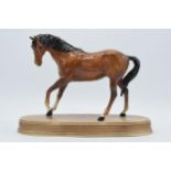 Beswick Spirit of Youth in gloss brown on ceramic base (detached). In good condition with no obvious