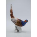 Meissen figure of a Pheasant, 16cm tall, with impressed numerals and 2 crossed swords backstamp.