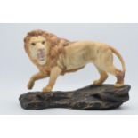 Beswick Lion on Rock A2554. Marked as a second though in good condition with no obvious damage or