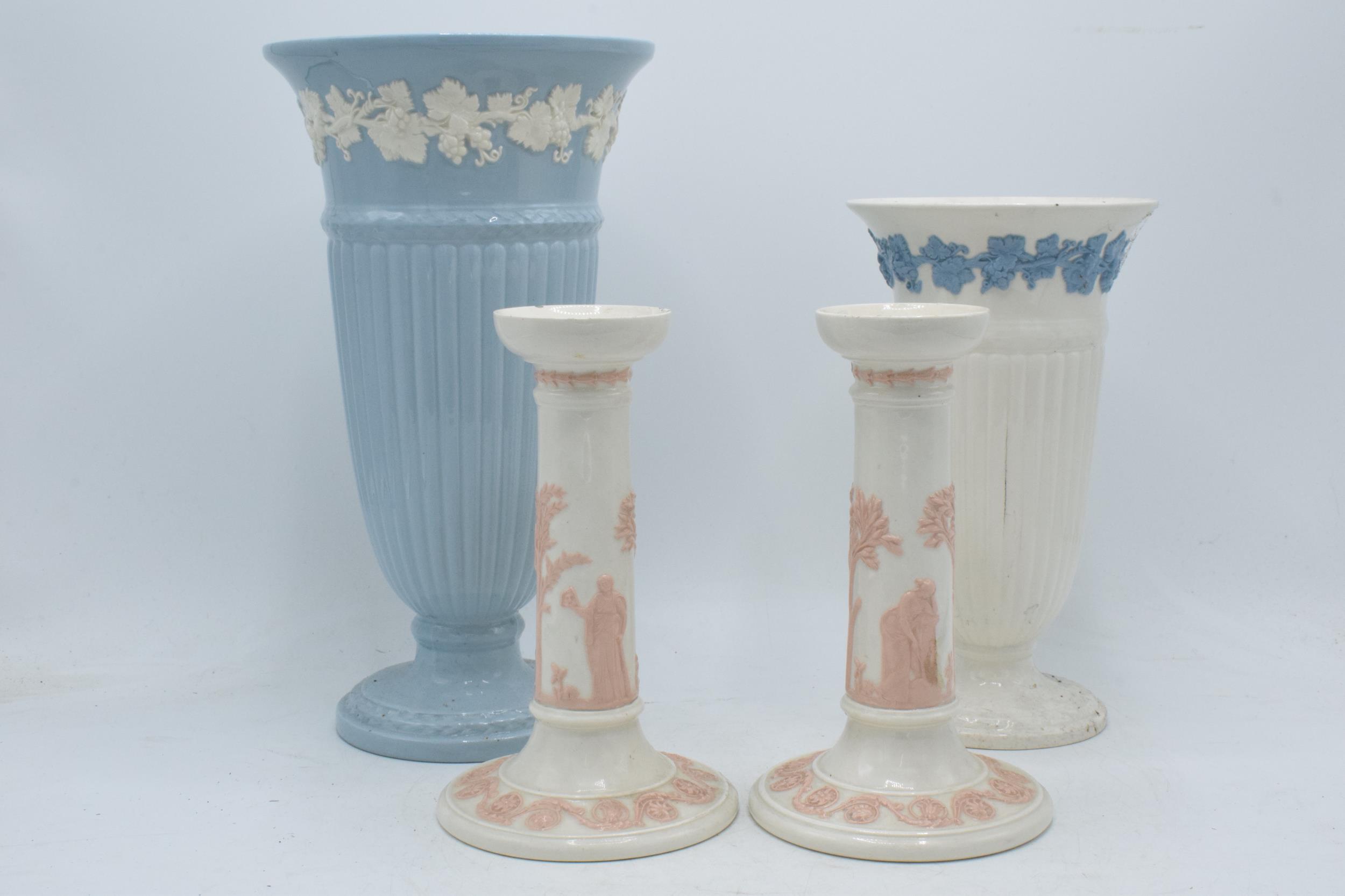 Wedgwood Queensware to include white on blue trumpet vase, 29cm tall, blue on white trumpet vase (