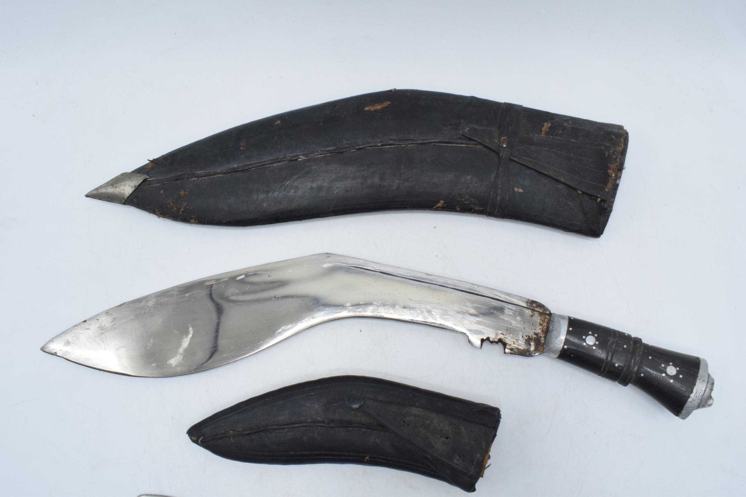 20th century Gurkha style Kukri knife in black leather scabbard together with smaller example (2), - Image 5 of 7