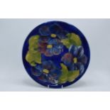 Large Moorcroft Hibiscus on blue charger / gateau plate, 31cm diameter. In good condition with no