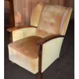 20th century Art-Deco upholstered chair with claw-like arm rests, 88cm tall, 78cm long, 65cm wide.