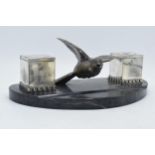 French Art-Deco ink well with a flying bird on marble base, 30cm wide.