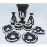 Wedgwood Jasperware in Black: to include a large 18cm vase, trinkets, bud vases and pin dishes (