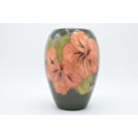 Moorcroft Hibiscus vase, 17cm tall. In good condition with no obvious damage or restoration. Varying