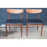 A pair of G-Plan black vinyl and teak dining chairs together with 2 unmarked folding chairs (4).