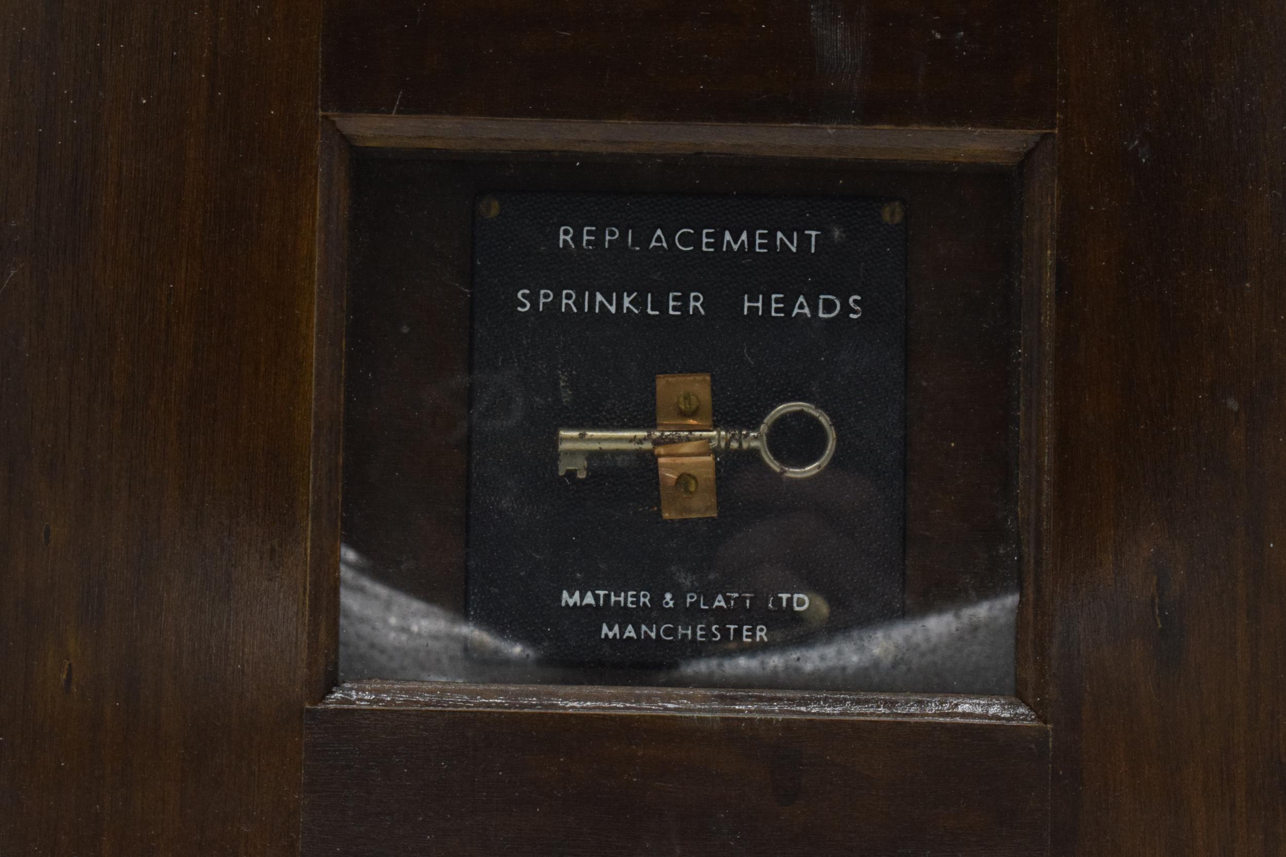 Vintage wooden cabinet, the centre panel enclosing a key 'Replacement Sprinkler Heads' by Mather & - Image 3 of 5