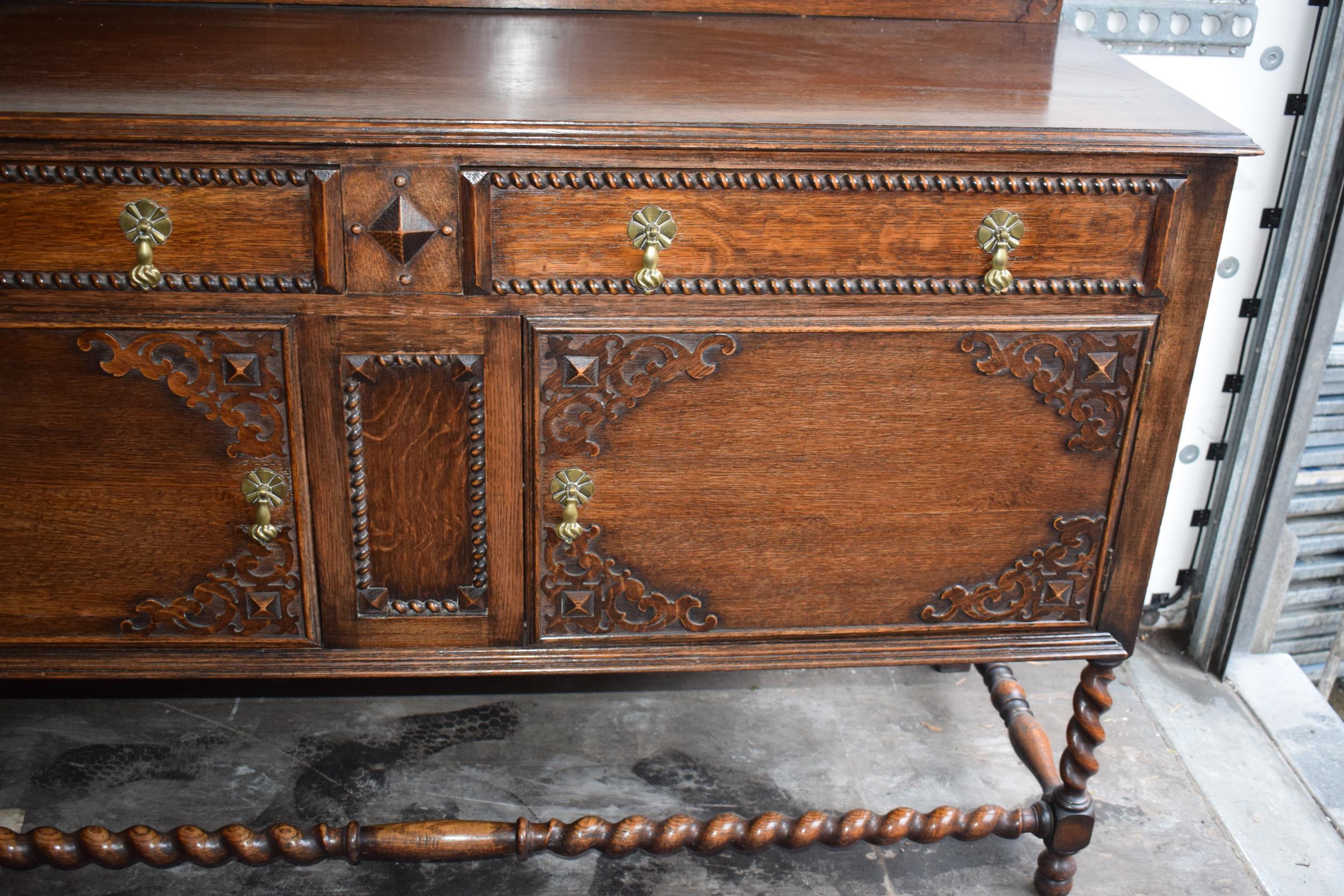 1930s oak sideboard with carved decoration with drawers and cupboards, 153x51x107cm tall. In good - Image 2 of 9