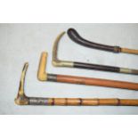 Country interest: a collection of sticks and riding crops to include leather topped cane, horn