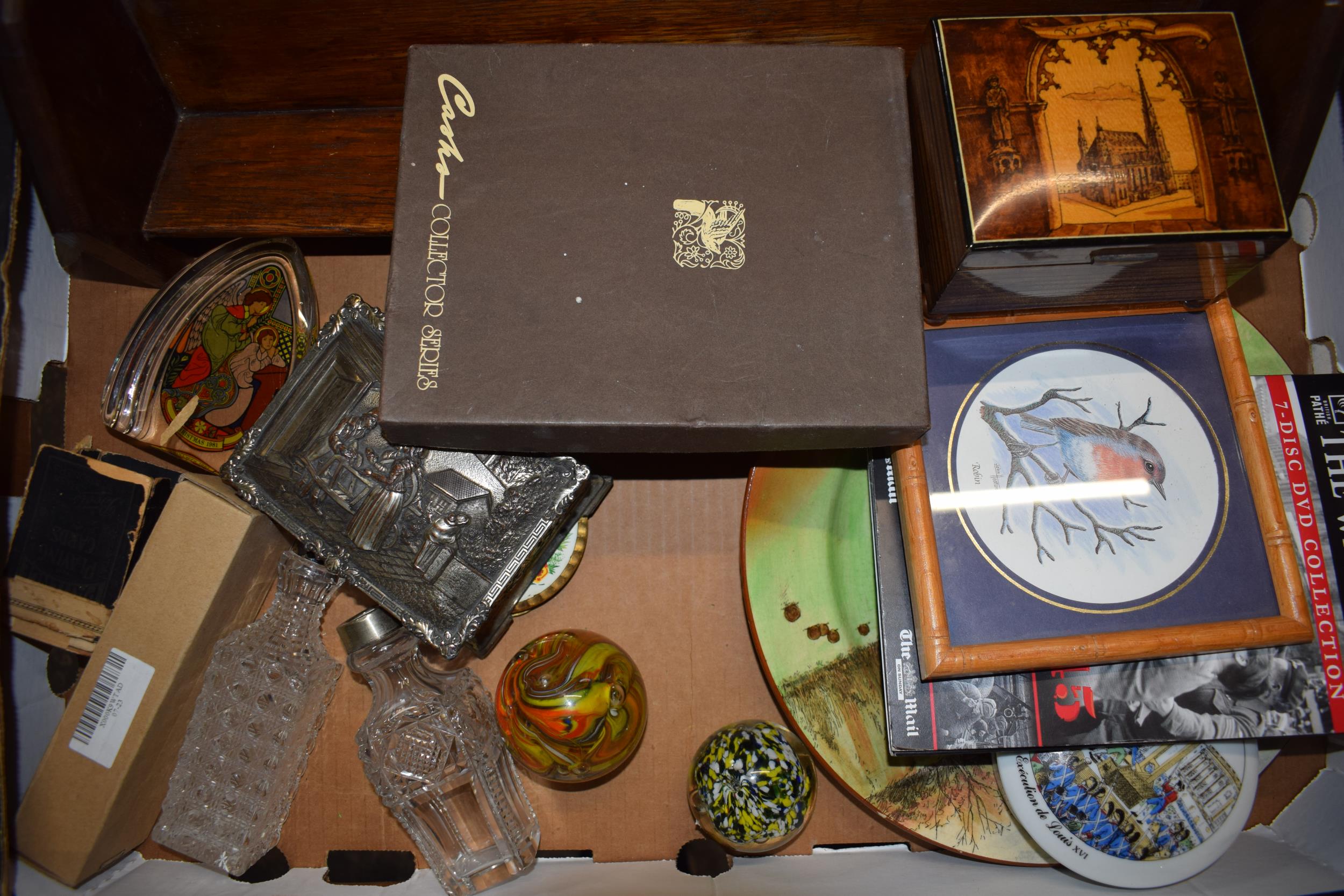 A mixed collection of items to include part cased cutlery canteen, glass paperweights, Doulton