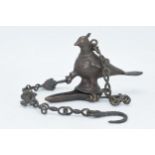 Brass hanging figural bird diya oil lamp with hanging chain, 18cm wide.