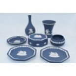 Wedgwood Jasperware in Cobalt Blue: to include octagonal trays, a trinekt, vases and others (7).