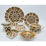 Royal Crown Derby Imari items to include a lidded sugar bowl, a milk jug, 21cm diameter shaped