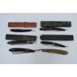 A collection of vintage cut throat razors, some with boxes, to include Solingen, Crown & Sword,