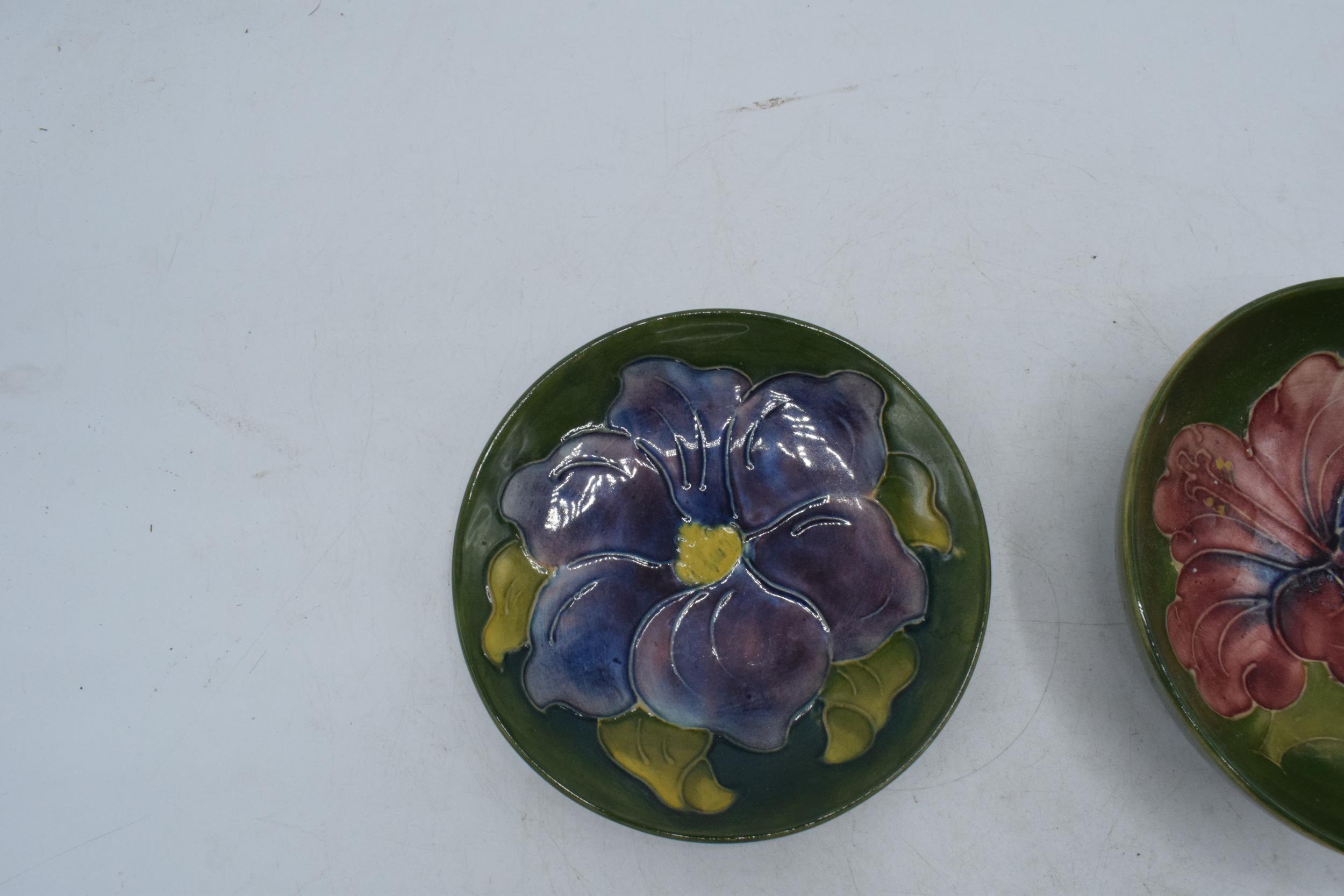 Moorcroft items in the Hibiscus design to include a shallow bowl and a pin tray, 12cm diameter ( - Image 3 of 3