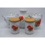 Royal Worcester Poppies tea ware to include 2 teapots, a vase and 2 storage jars (5). In good