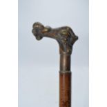Unusual malacquer (or similar) walking cane with bronze moulded putti handle, 87cm long. Cane is