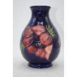 Moorcroft large floral vase on blue backgound, 19cm tall. In good condition with no obvious damage