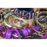 A large and varied collection of costume jewellery to include bangles, bracelets, necklaces, chain