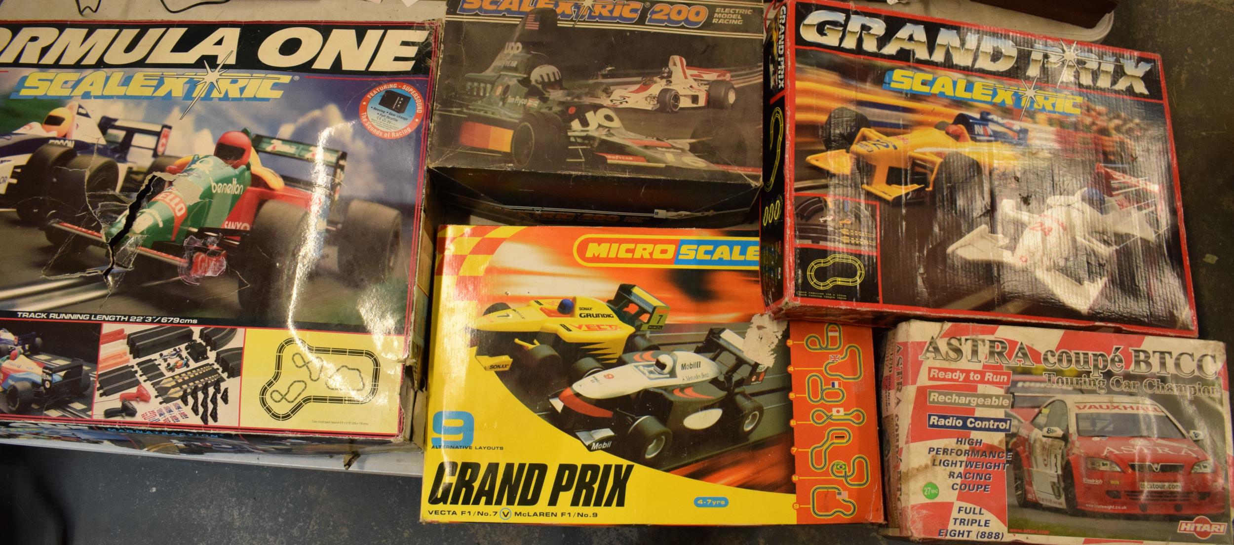 A collection of vintage Scalextric to include C646, 200, Micro Scalextric Grand Prix, a similar