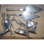 A collection of silver plate to include Falstaff cake slices, gravy boat, vase and others (Qty).