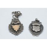 A pair of hallmarked silver fobs, 23.4 grams.