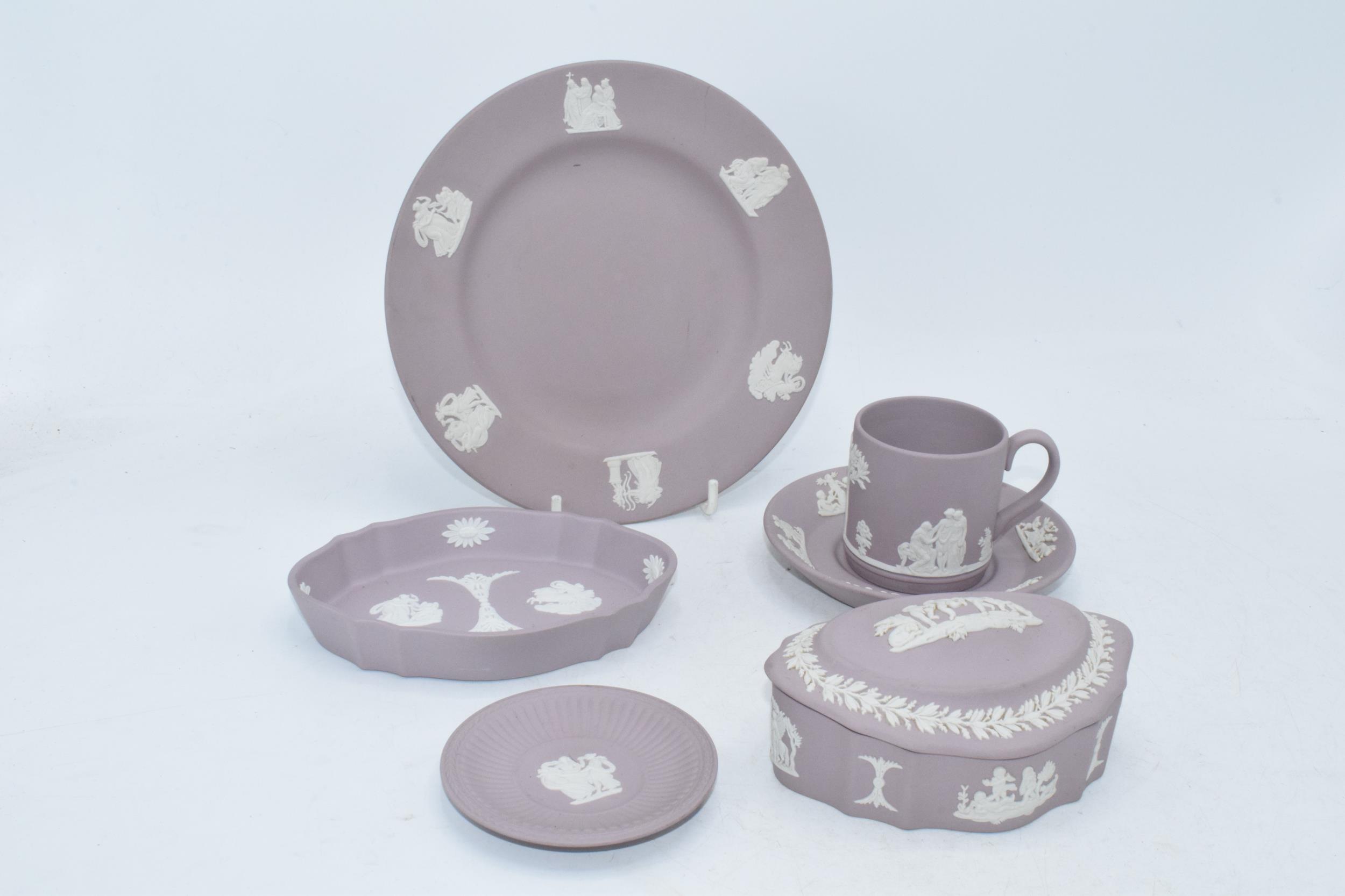 Wedgwood Jasperware in Lilac: to include a coffee can and saucer, a plate, trinket and a dish (6).