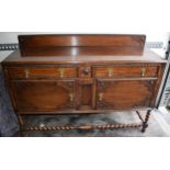 1930s oak sideboard with carved decoration with drawers and cupboards, 153x51x107cm tall. In good
