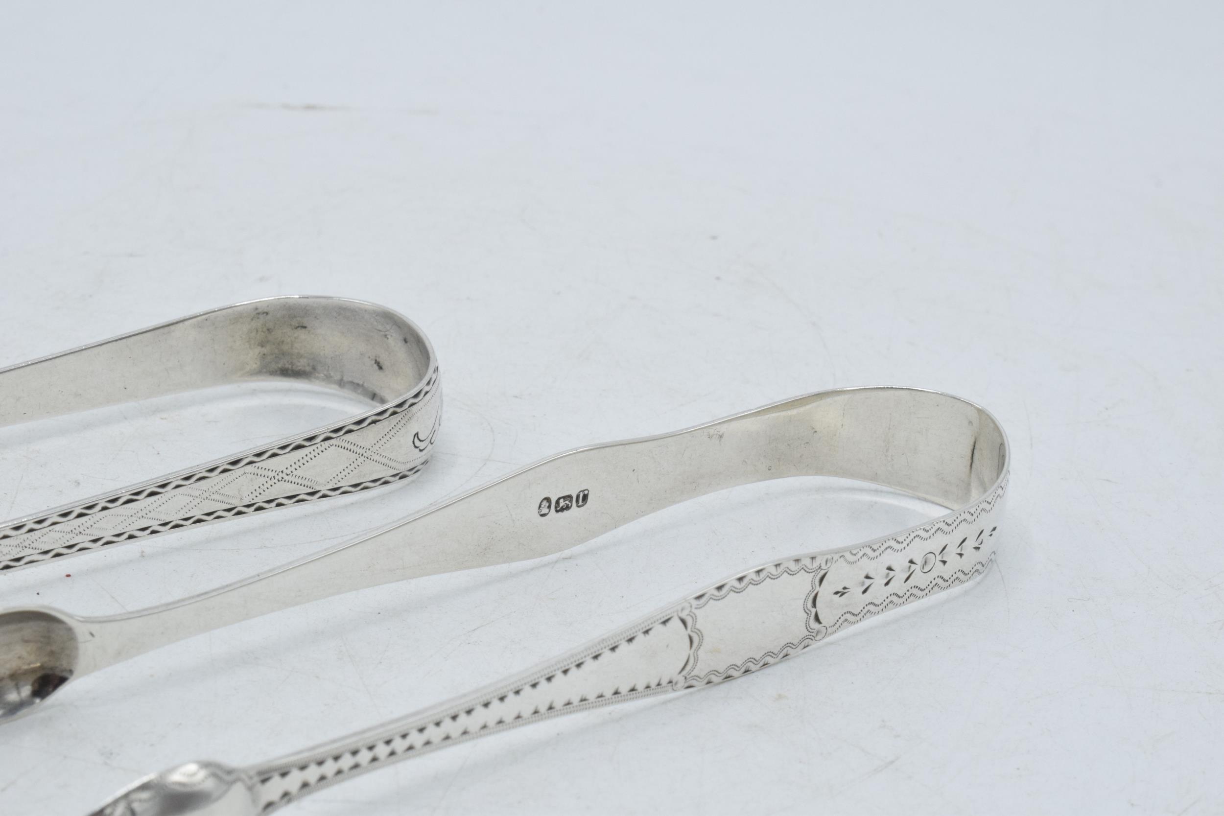 Two pairs of Scottish silver tongs to include a Georgian pair of plain form, Edinburgh 1805, - Image 4 of 6