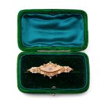 9ct gold bar brooch set with diamond chip, 3.9 grams, in box.