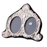 Hallmarked silver fronted double photo frame, 18cm wide, Birmingham 1995.