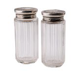 A pair of silver topped dressing table jars, 9.5cm tall, London 1910 (2).