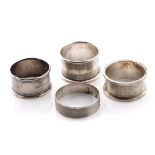 A selection of silver napkin rings to include Rolason Brothers Birmingham 1924, Hazlewoods