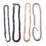 A collection of 4 faux pearl necklaces of varying colours (4).