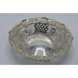 Silver sweet dish with repousse and pierced decoration, 36.4 grams, Chester 1897, 12cm diameter.